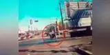 YouTube: Dos hombres evitan que una anciana sea arrollada por un tren (VIDEO)
