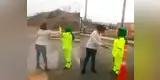 Trabajadora que dirigía el tránsito es insultada y golpeada por mujer racista [VIDEO]