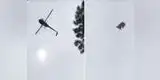 Desalmados sujetos arrojan un cerdo desde un helicóptero a una piscina [VIDEO]