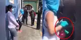 Mujer hace sentadillas en la cola y cuando pasan personas las fumiga [VIDEO]