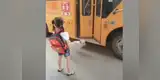 Facebook: Perrito acompaña a su pequeña dueña a tomar el autobus escolar y la escena se vuelve viral [VIDEO]