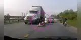 Madre arriesga su vida para salvar a su hija de ser atropellada por un camión [VIDEO]
