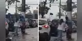 Mujer ayuda a un indigente que pasaba frío en la calle y escena conmueve a miles [VIDEO]