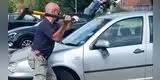 YouTube: hombre revienta la ventana de un auto para rescatar a perrito que dejaron encerrado [VIDEO]