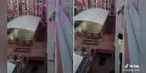 Hombre arriesgó su vida para salvar a perrito que colgaba de un balcón [VIDEO]