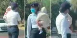 Mujer policía es captada dirigiendo el tránsito con su bebé en brazos [VIDEO]