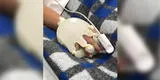 "Creía estar tocando la mano de Dios": enfermera consuela a paciente COVID usando guantes con agua