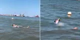 ¿Jack Sparrow? Hombre es captado flotando en el mar con su botella de cerveza en la mano [VIDEO]
