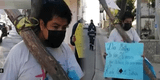 Huancayo: joven carga una cruz por las calles pidiendo justicia por asesinato de su madre [VIDEO]