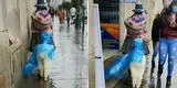 Mujer protege con poncho impermeable a su alpaca bebe de la lluvia en Cusco y enternece redes [VIDEO]