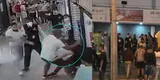 Miraflores: Jaladores y comerciantes de galería Compu Palace se agarran a golpes como en ring de box