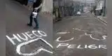 Peruano marca con pintura los grandes huecos de calles y escena genera diversas reacciones [FOTOS]