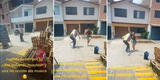 Pasan por su casa bailando huaylas, pero peruana no se resiste al ritmo y los acompaña 'robándose' el show en la calle [VIDEO]