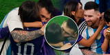 Messi y Antonella Roccuzzo se dan tierno beso en la cancha con la Copa del Mundo conquistada por Argentina