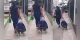 Captan a mujer llevando a niño en un coche de compras: “Yo cuando acompañaba a mi mamá al mercado a las 5 am”