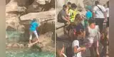 Turista escala la Fontana di Trevi para llenar su botella de agua: "El más caro del mundo"