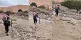 Tacna: valiente profesor lleva a su alumna en la espalda para cruzar río y no pierda clases