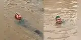 Hombre sorprende al nadar en bypass inundado en Villa María del Triunfo tras fuertes lluvias en Lima