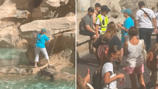 Turista escala la Fontana di Trevi para llenar su botella de agua: "El más caro del mundo"