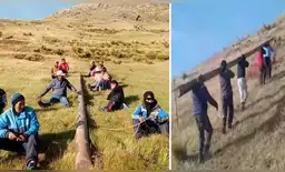 Padres de familia trasladaron poste por la empinada pendiente de la montaña Patapata.