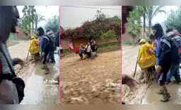 Un usuario en TikTok captó a un heladero de D'Onofrio cruzando el huaico y ayudando. Un usuario en TikTok captó a un heladero de D'Onofrio cruzando el huaico y ayudando.