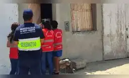 Madre de familia quema a su hijo con agua hirviendo por comerse las golosinas que vendía.