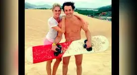 Lo olvida con gimnasta brasileño Diego Hypólito, con quien goza en playa.