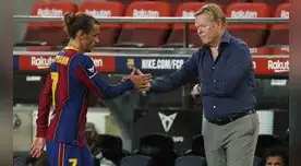 El saludo de Griezman y su técnico Koeman.