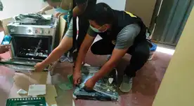 En plena diligencia de registro en la cocina