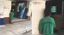 La fotografía de un niño tratando de ver dibujos animados asomado en una tienda conmueve en redes sociales