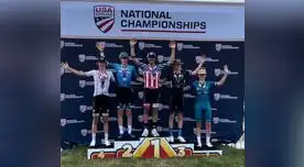 Posa Alejandro Che muy orgulloso en el podio