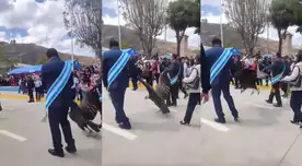 Condor andino siendo arrastrado por autoridades.