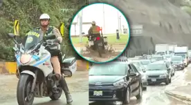 Policía casi pierde el control al pasar por aniego de la Costa Verde.