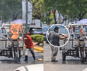 Un hombre apaga incendio de una motocicleta con una Coca-Cola en México.