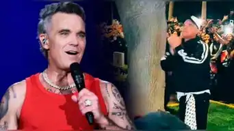 Robbie Williams CANTA junto a sus fans a las afueras de su hotel tras CANCELACIÓN de su segundo concierto