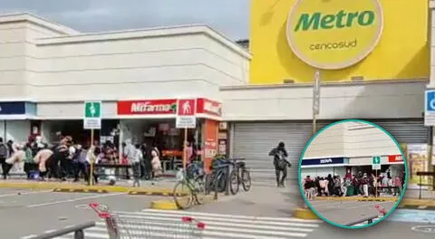 Peatón grabó con su celular a cientos de personas saqueando Metro de Huancayo.