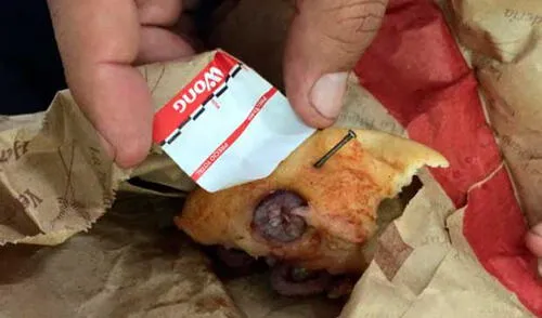 Clavo en delicioso pan de tienda Wong. elpopular.pe