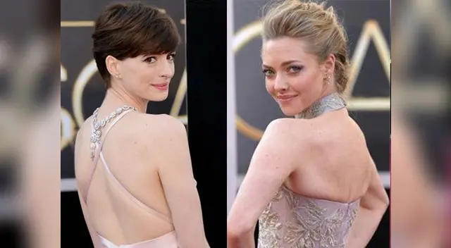 Anne Hathaway (Prada) y Amanda Seyfried (Valentino) en la alfombra roja del Oscar 2013.