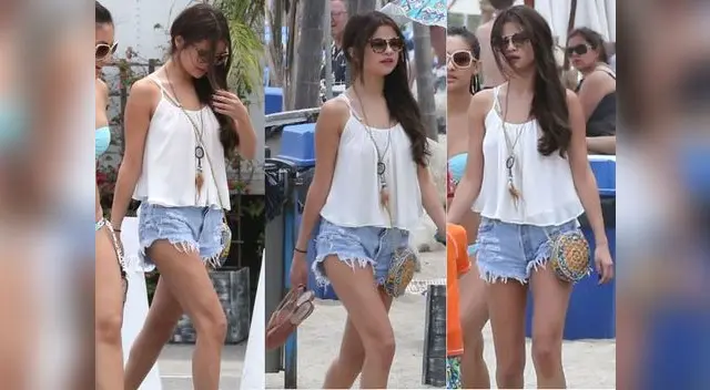 Selena Gomez usando los mismos shorts durante un paseo en la playa