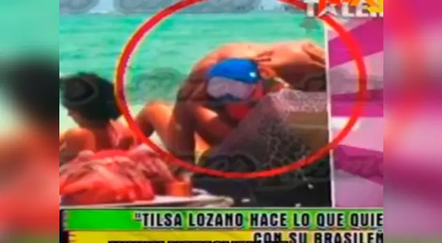 Tilsa Lozano y Rafael Cardozo besándonse.