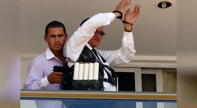 Sujeto gritaba ser terrorista y tomó a empleado como rehén.