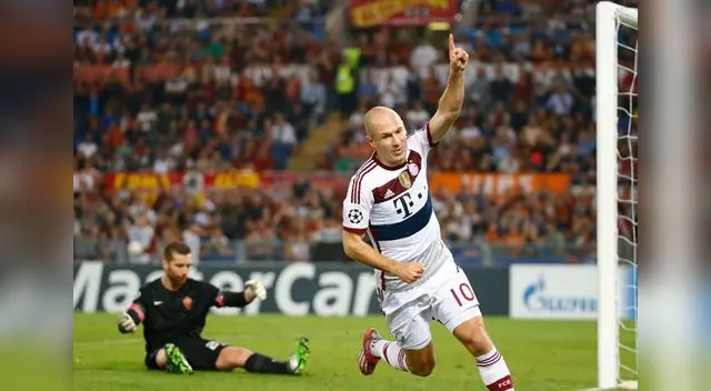 Robben celebra una de sus conquistas, mientras el arquero de la roma sufre la caída. el holandés fue figura.