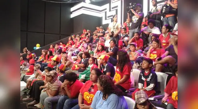 Niños entre el público. 