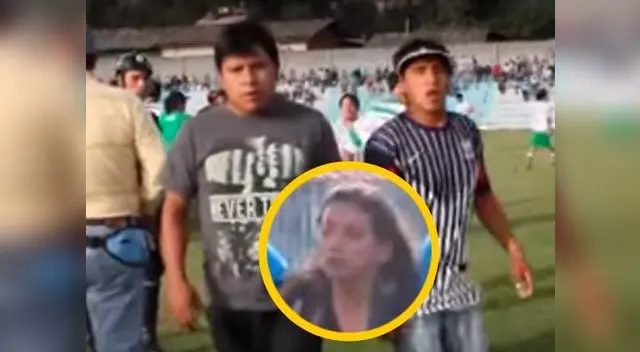 Supuestos agresores de la reportera aparecen en el primer plano de la imagen. Supuestos agresores de la reportera aparecen en el primer plano de la imagen.