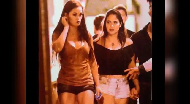 Angie Arizaga junto a joven.