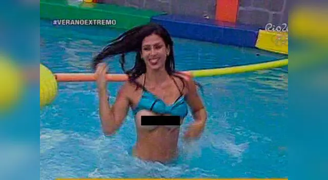 El bikini no pudo contener su poderosa delantera.