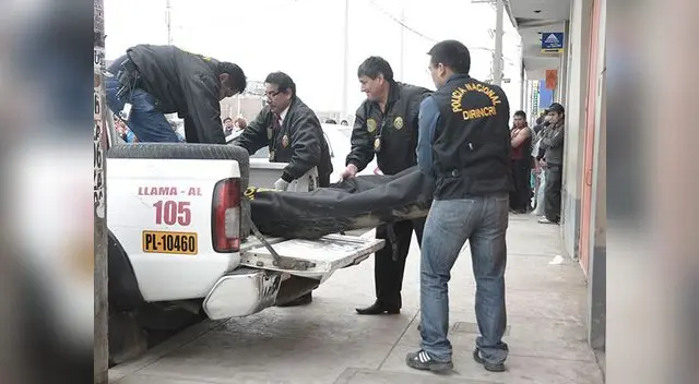 Policía investiga el crimen Policía investiga el crimen