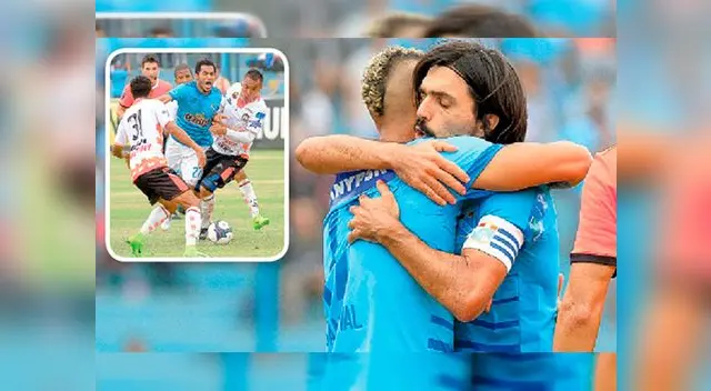 Cazulo felicita a Sandoval, que anotó el segundo gol y cerró la cuenta a favor de Sporting Cristal Cazulo felicita a Sandoval, que anotó el segundo gol y cerró la cuenta a favor de Sporting Cristal