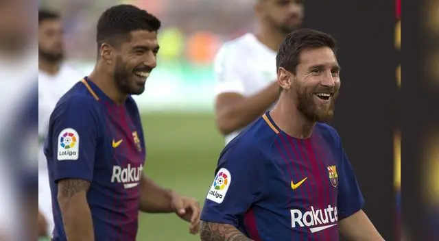 Suárez y Messi celebran al final del encuentro