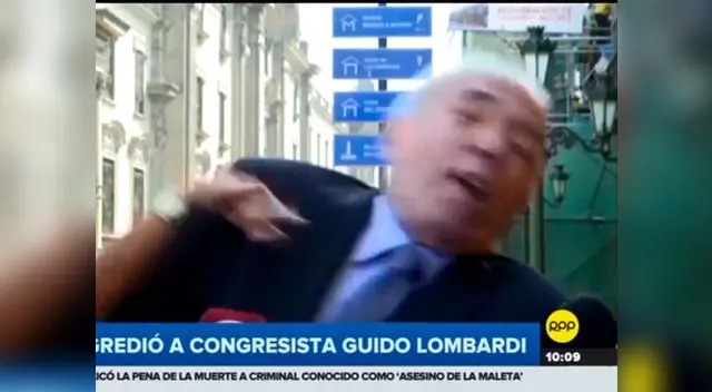 Mujer agredió a congresista Guido Lombardi cuando declaraba a la prensa 